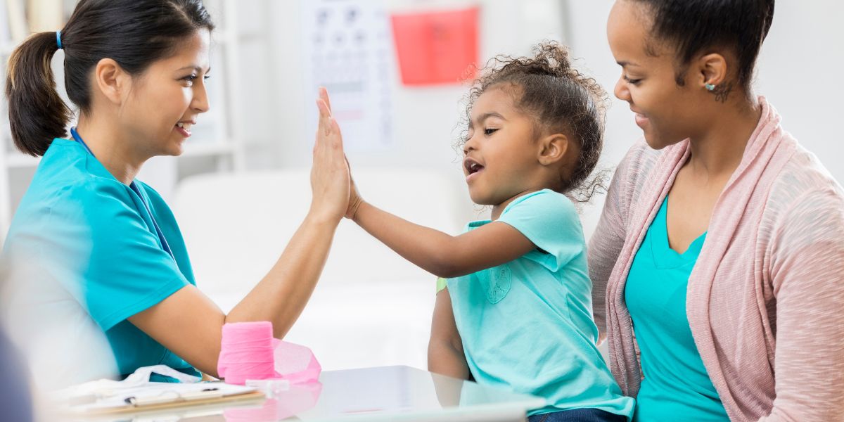 Pediatric nurse and patient