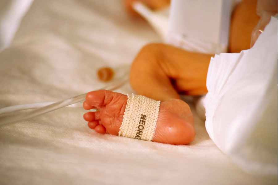 foot of premature baby in an incubator