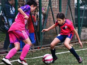 Athletes playing soccer