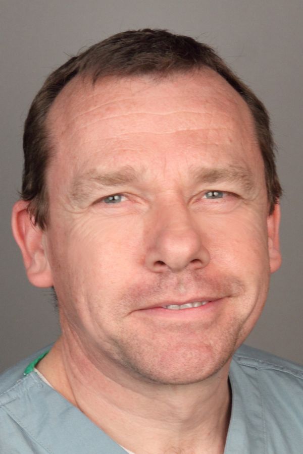 Headshot of Nicholas West